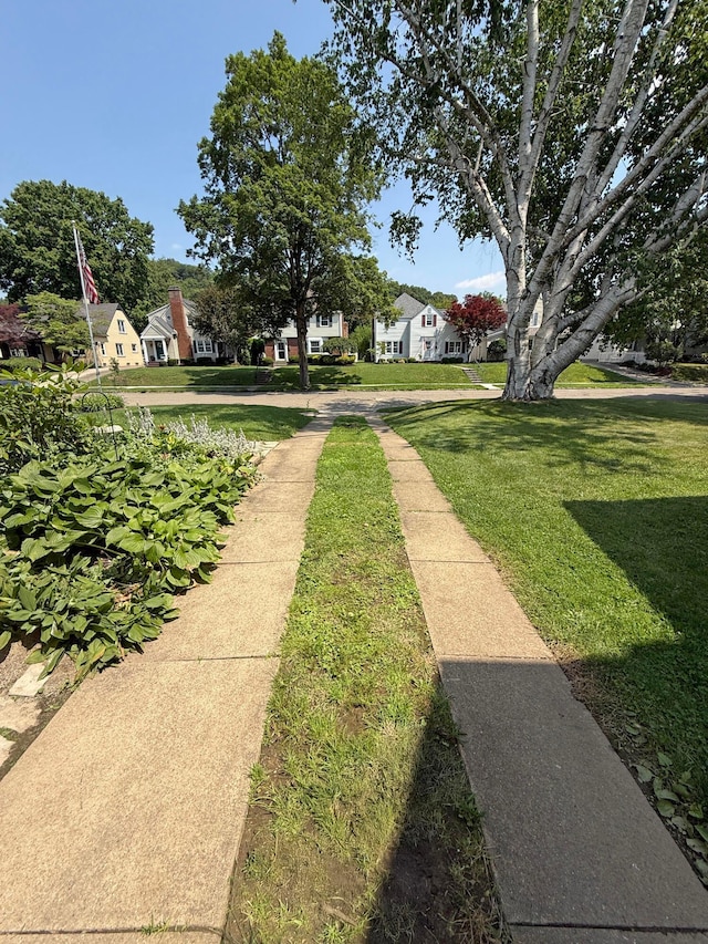 550 E Allen St, Lancaster, OH 43130 - view of community featuring a lawn and a residential view