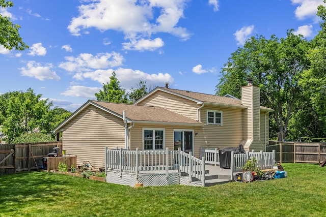 5690 Brinkley Ct, Columbus, OH 43235 - rear view of property with a fenced backyard, a wooden deck, a chimney, and roof with shingles