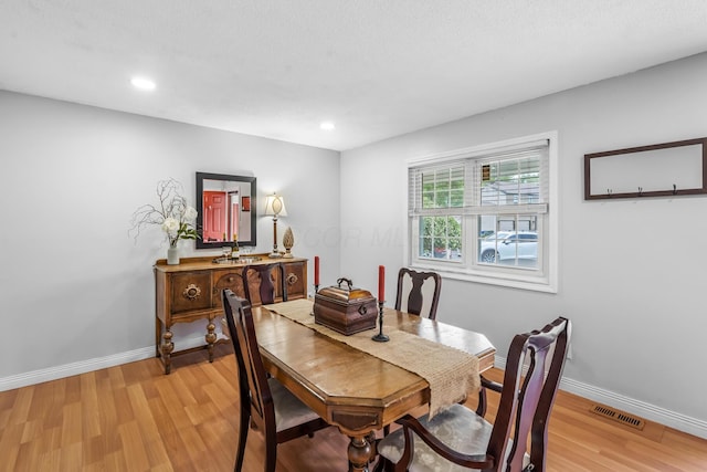 5690 Brinkley Ct, Columbus, OH 43235 - dining space featuring light wood-style floors and recessed lighting