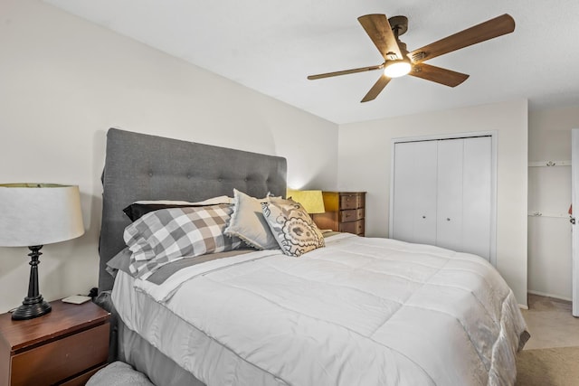 5690 Brinkley Ct, Columbus, OH 43235 - carpeted bedroom with a closet and a ceiling fan