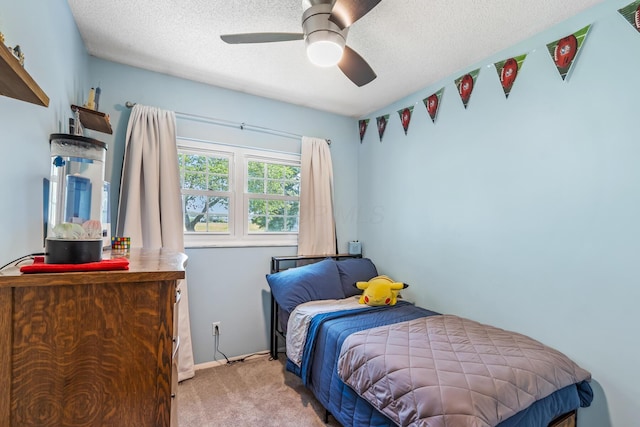 5690 Brinkley Ct, Columbus, OH 43235 - bedroom featuring carpet floors, a textured ceiling, and a ceiling fan