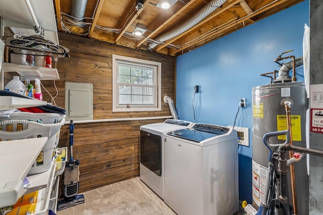 5690 Brinkley Ct, Columbus, OH 43235 - laundry area featuring water heater, washing machine and dryer, wooden walls, carpet flooring, and electric panel