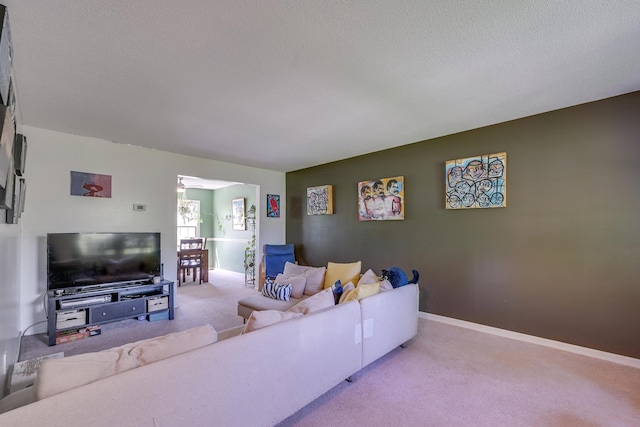 655 Providence Ave Unit 9-655J, Columbus, OH 43214 - carpeted living room with baseboards