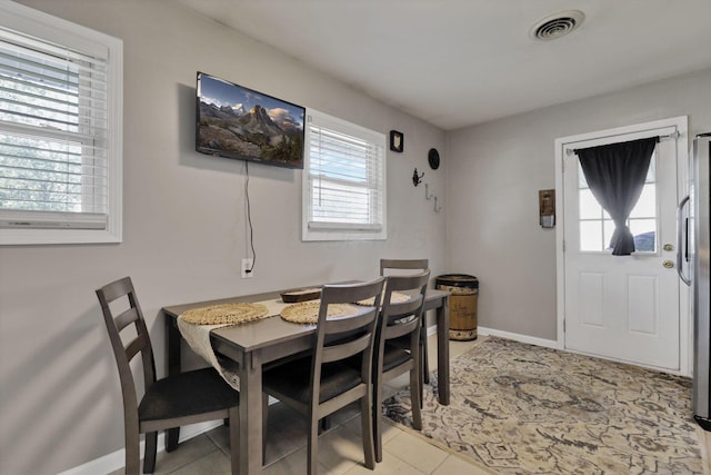 1015 Westview Dr, Hebron, OH 43025 - dining area featuring baseboards and light tile patterned floors