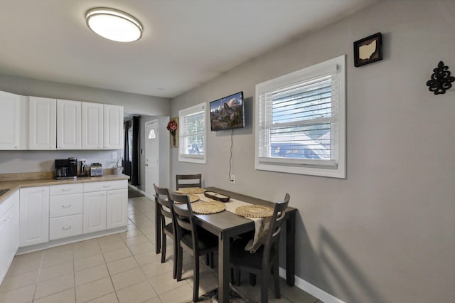 1015 Westview Dr, Hebron, OH 43025 - dining area with light tile patterned floors and baseboards