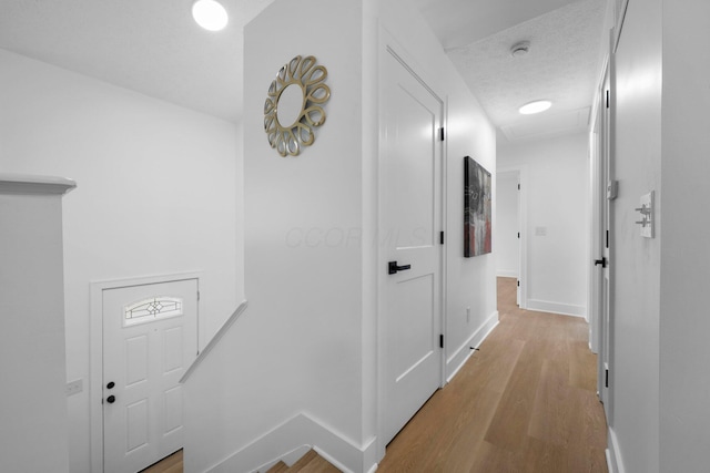 1047 Cherry Bud Dr, Columbus, OH 43228 - hall with light wood-type flooring and baseboards