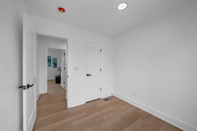 1047 Cherry Bud Dr, Columbus, OH 43228 - unfurnished bedroom with light wood-type flooring and baseboards