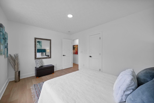 1047 Cherry Bud Dr, Columbus, OH 43228 - bedroom with wood finished floors and baseboards