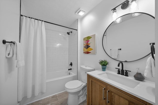 1047 Cherry Bud Dr, Columbus, OH 43228 - full bath with vanity, toilet, shower / tub combo with curtain, and a textured ceiling