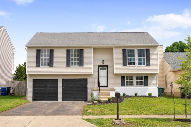 1047 Cherry Bud Dr, Columbus, OH 43228 - raised ranch featuring asphalt driveway and a garage