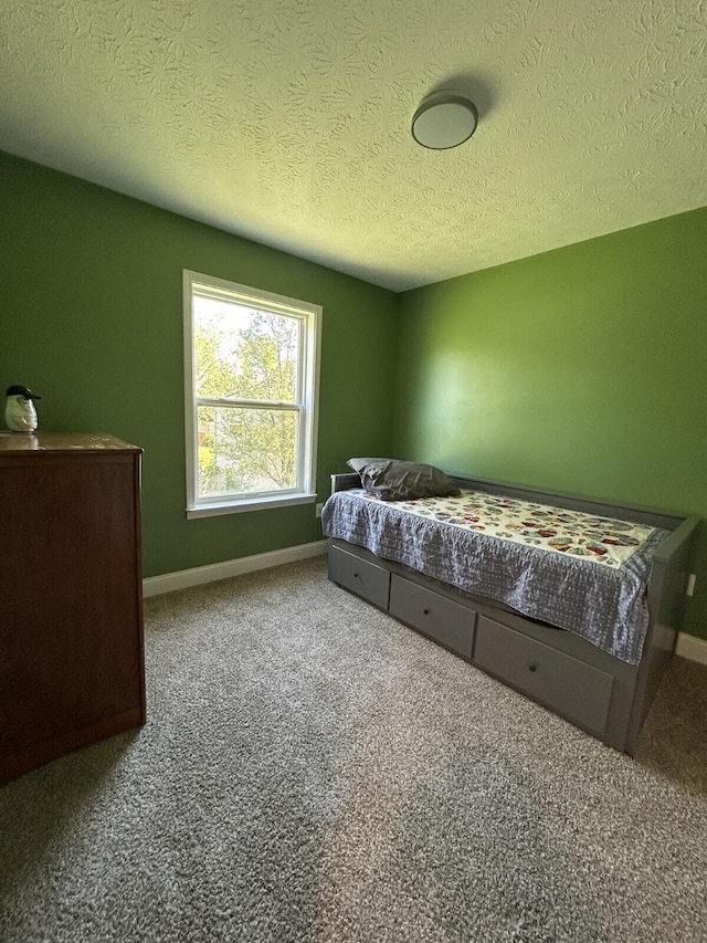 5321 Longshadow Dr, Westerville, OH 43081 - carpeted bedroom with baseboards and a textured ceiling