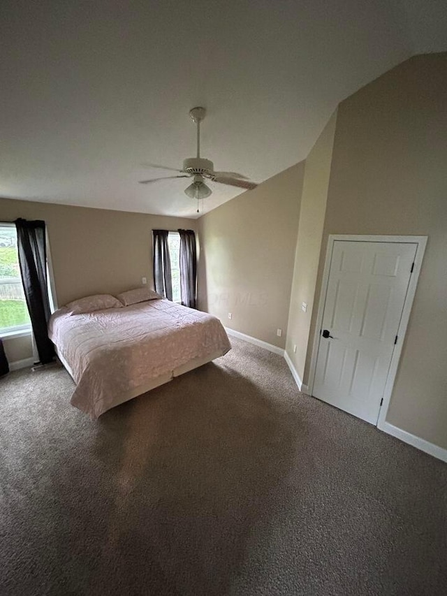 5321 Longshadow Dr, Westerville, OH 43081 - carpeted bedroom with lofted ceiling, multiple windows, baseboards, and ceiling fan