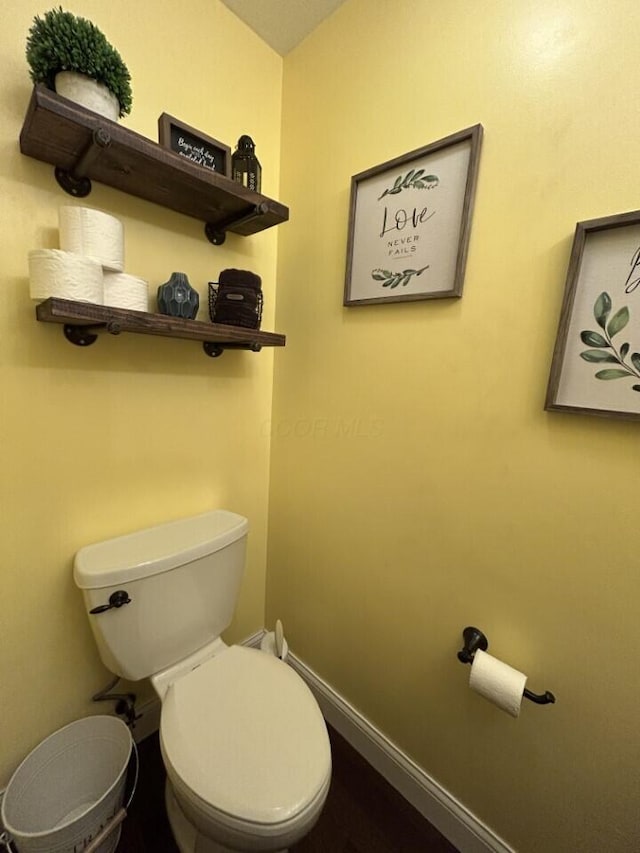 5321 Longshadow Dr, Westerville, OH 43081 - bathroom featuring toilet and baseboards