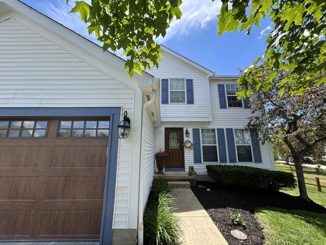 5321 Longshadow Dr, Westerville, OH 43081 - view of front of house with a garage