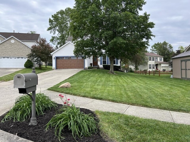 5321 Longshadow Dr, Westerville, OH 43081 - view of front of home with concrete driveway, a front lawn, and an attached garage