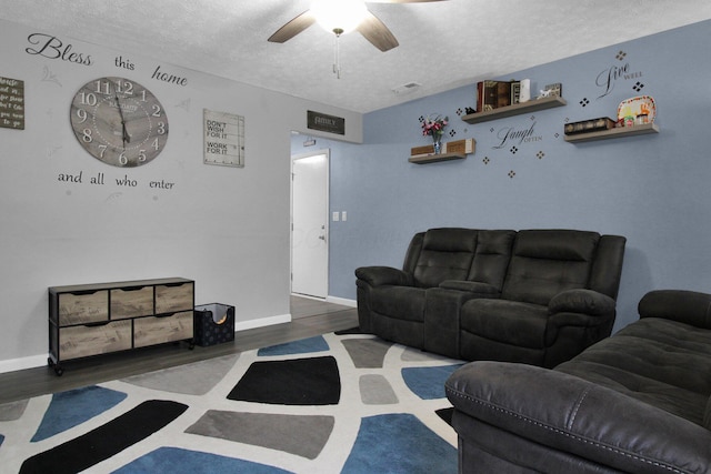 4037 Millview Ct, Columbus, OH 43207 - living area featuring a ceiling fan, a textured ceiling, wood finished floors, and baseboards