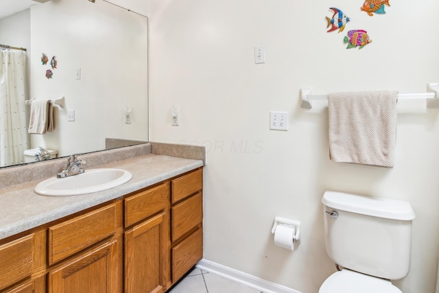 2049 Brandy Mill Ln, Dayton, OH 45459 - full bath with tile patterned flooring, vanity, toilet, and baseboards