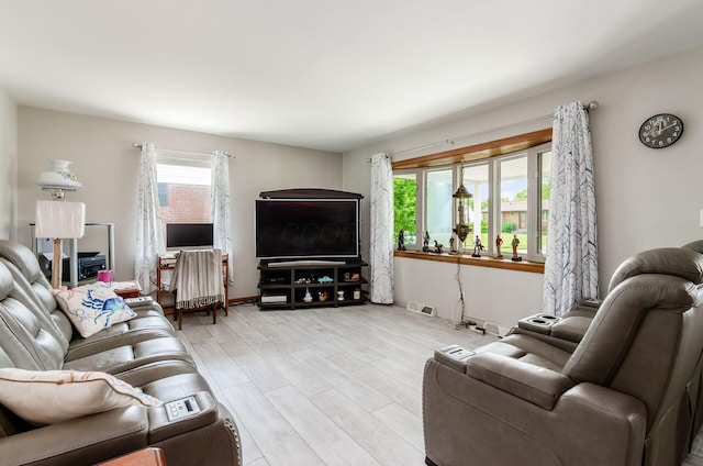 52 Amsterdam Ave, Columbus, OH 43207 - living room featuring healthy amount of natural light and wood finished floors