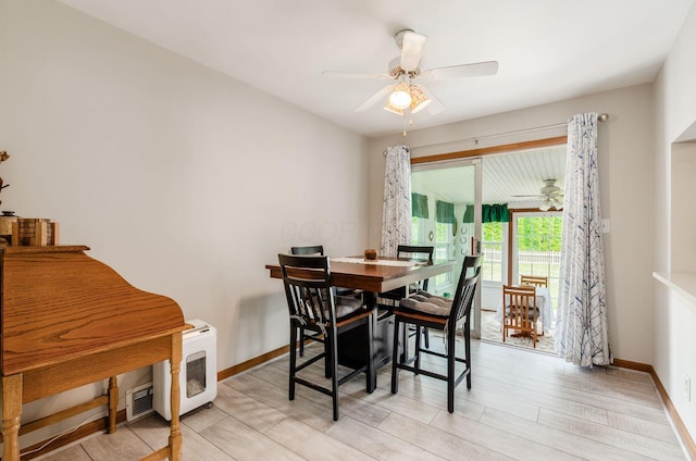 52 Amsterdam Ave, Columbus, OH 43207 - dining space featuring a ceiling fan, light wood-style flooring, and baseboards