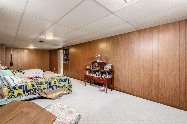 52 Amsterdam Ave, Columbus, OH 43207 - bedroom with carpet, wooden walls, and a drop ceiling