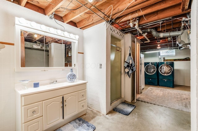 52 Amsterdam Ave, Columbus, OH 43207 - unfinished below grade area with washing machine and clothes dryer and a sink
