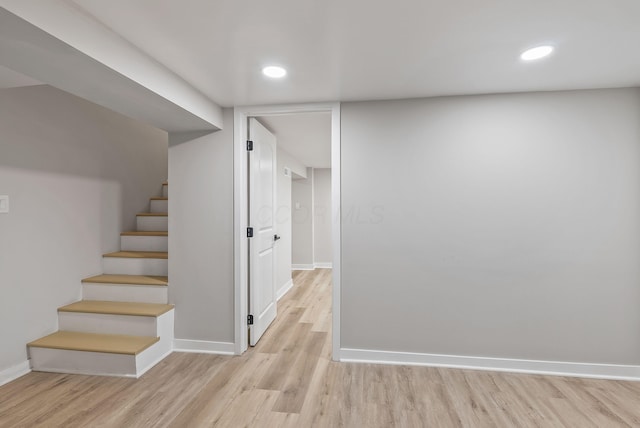 341 Woodland Ave, Columbus, OH 43203 - stairway with wood finished floors, baseboards, and recessed lighting