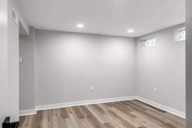 341 Woodland Ave, Columbus, OH 43203 - unfurnished room featuring wood finished floors, recessed lighting, and baseboards