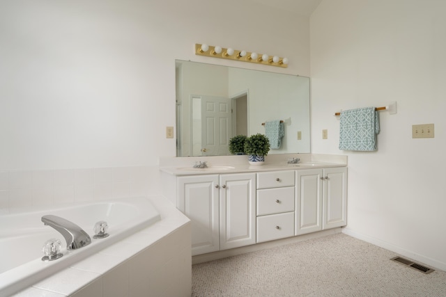 3899 Hampshire Ave, Powell, OH 43065 - bathroom with double vanity and a bath
