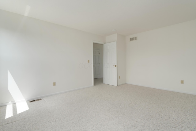 3899 Hampshire Ave, Powell, OH 43065 - spare room with light colored carpet and baseboards