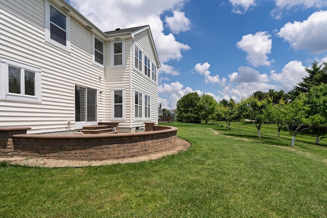 3899 Hampshire Ave, Powell, OH 43065 - view of green lawn with a patio area