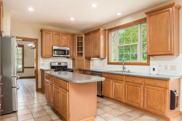 3308 Vinton Park Pl, Hilliard, OH 43026 - kitchen with stainless steel appliances, a sink, a center island, tasteful backsplash, and recessed lighting