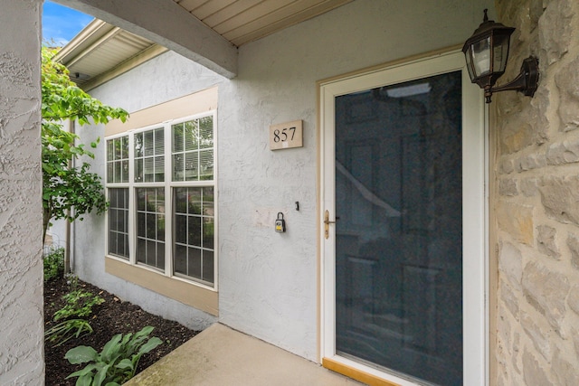 857 Village Dr, Delaware, OH 43015 - entrance to property featuring stucco siding