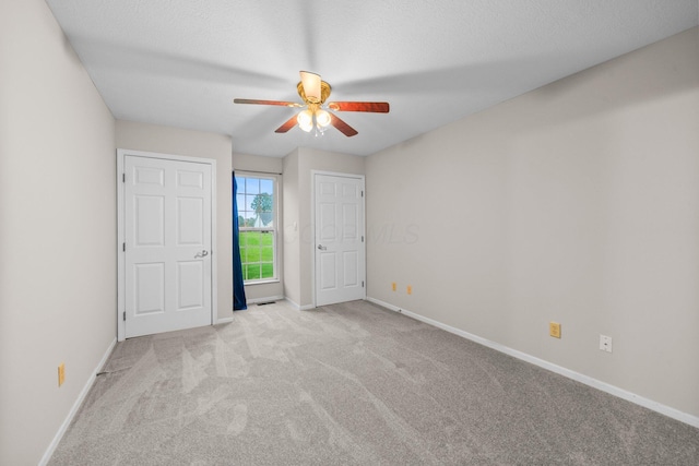 857 Village Dr, Delaware, OH 43015 - unfurnished bedroom with carpet flooring, baseboards, and a ceiling fan
