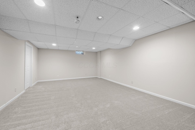 857 Village Dr, Delaware, OH 43015 - finished basement featuring carpet flooring, recessed lighting, baseboards, and a paneled ceiling