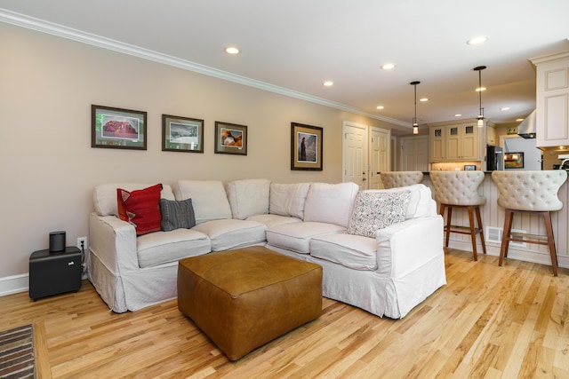 1332 Castleton Rd N, Columbus, OH 43220 - living area featuring crown molding, light wood-style floors, recessed lighting, and baseboards