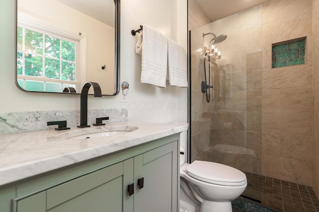 1332 Castleton Rd N, Columbus, OH 43220 - bathroom with vanity, toilet, and tiled shower
