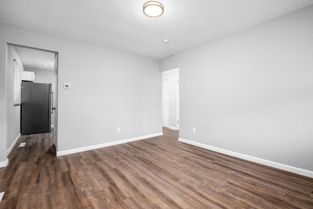 2280 Velma Ave, Columbus, OH 43211 - unfurnished room featuring dark wood-type flooring and baseboards