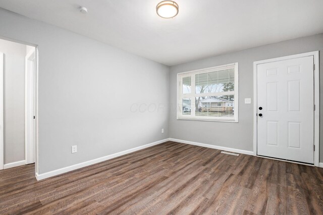 2280 Velma Ave, Columbus, OH 43211 - foyer entrance featuring wood finished floors and baseboards
