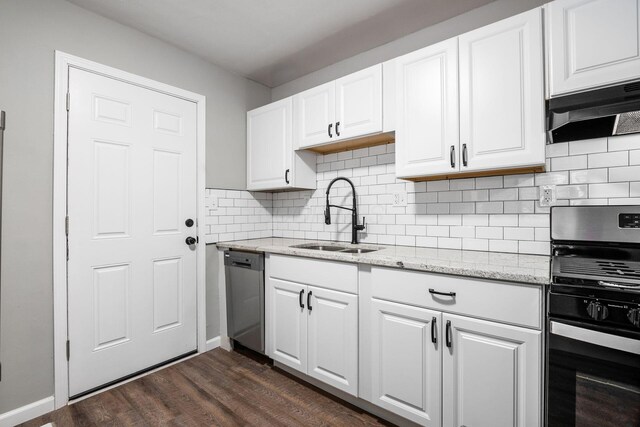 2280 Velma Ave, Columbus, OH 43211 - kitchen featuring stainless steel appliances, a sink, under cabinet range hood, white cabinetry, and dark wood-style flooring