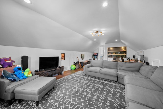5781 Glendavon Loop, Dublin, OH 43016 - living area with vaulted ceiling, wood finished floors, built in features, recessed lighting, and baseboards