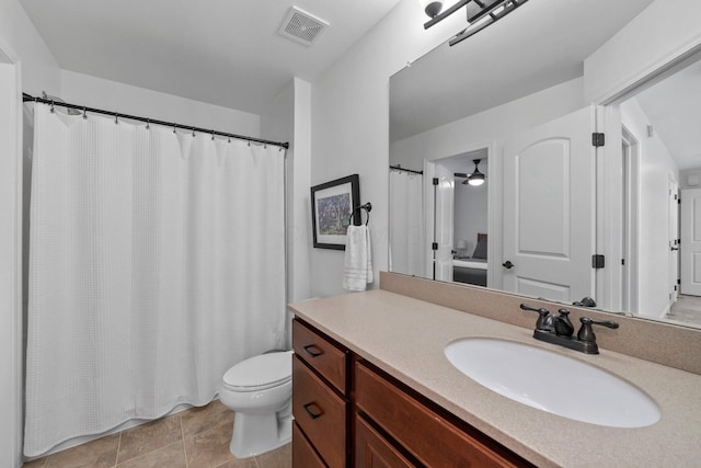 5781 Glendavon Loop, Dublin, OH 43016 - bathroom with toilet, vanity, curtained shower, and tile patterned flooring
