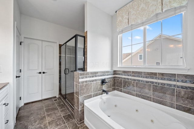 5781 Glendavon Loop, Dublin, OH 43016 - full bath with a jetted tub, vanity, and a shower stall