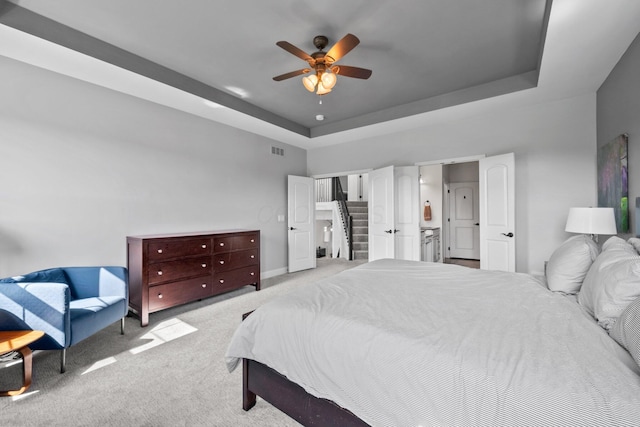 5781 Glendavon Loop, Dublin, OH 43016 - carpeted bedroom with a tray ceiling, baseboards, and ceiling fan