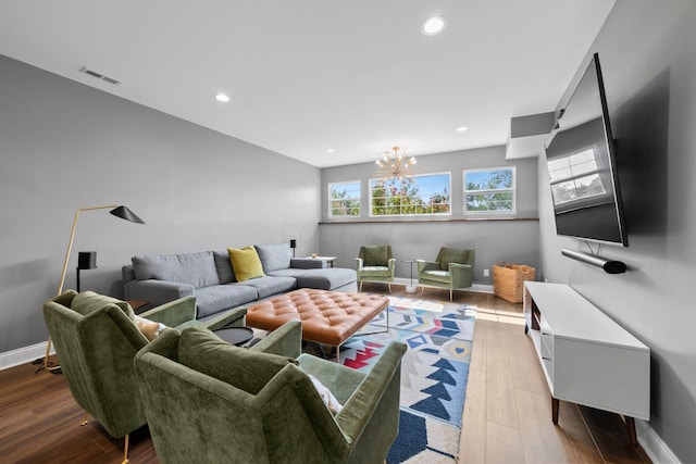 5781 Glendavon Loop, Dublin, OH 43016 - living room featuring wood finished floors, baseboards, a chandelier, and recessed lighting