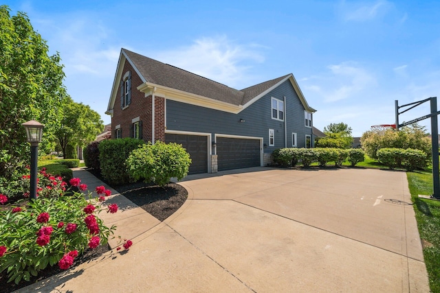 5781 Glendavon Loop, Dublin, OH 43016 - view of side of property featuring driveway and a garage