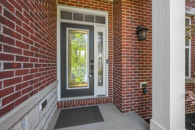 5781 Glendavon Loop, Dublin, OH 43016 - doorway to property featuring brick siding