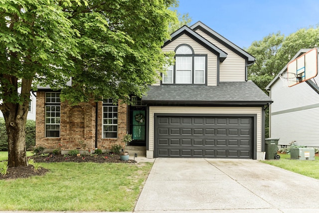 4465 Big Walnutview Dr, Columbus, OH 43230 - traditional-style home featuring driveway, a garage, a front lawn, brick siding, and roof with shingles