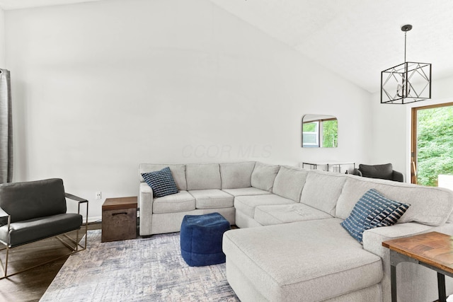 4465 Big Walnutview Dr, Columbus, OH 43230 - living room featuring a chandelier, wood finished floors, and high vaulted ceiling