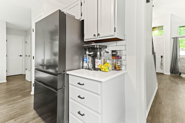 4465 Big Walnutview Dr, Columbus, OH 43230 - kitchen featuring light wood-style flooring, freestanding refrigerator, baseboards, and light countertops
