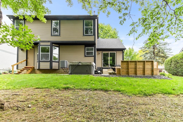 4465 Big Walnutview Dr, Columbus, OH 43230 - rear view of house with entry steps, a yard, and central AC